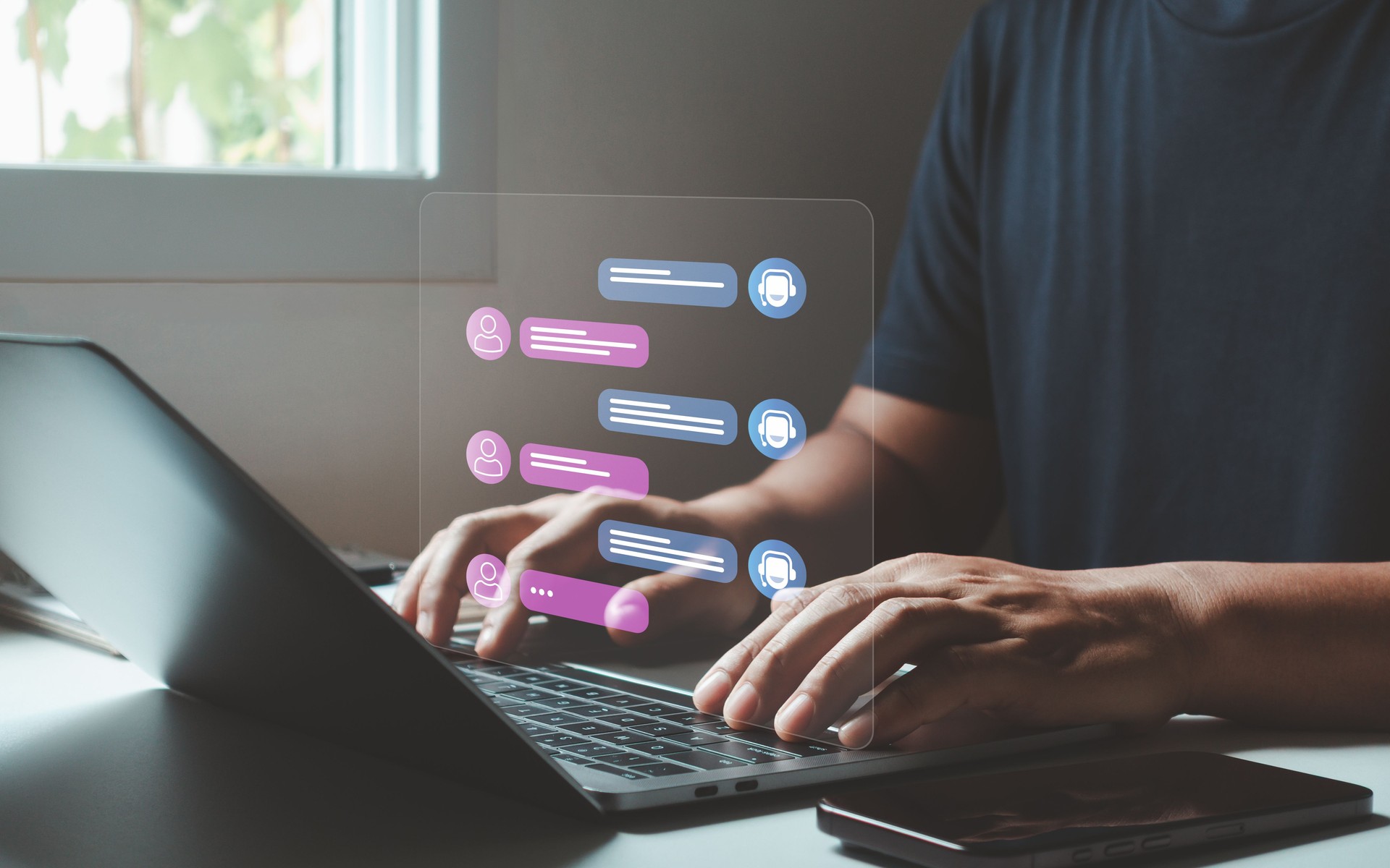 AI Chatbot Virtual Assistant Interface for Online Communication and Customer Support. Man using laptop with futuristic chatbot showing real-time conversation between user and AI virtual assistant.